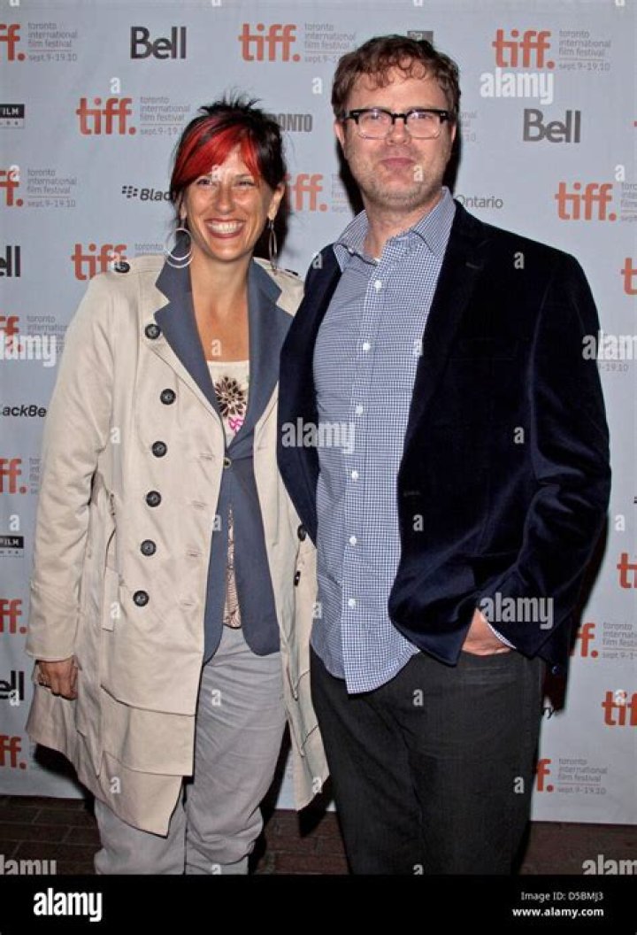 Actor Rainn Wilson and his wife Holiday Reinhorn arrive at the 26th