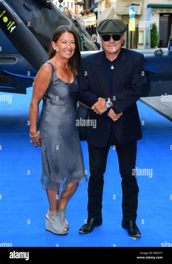 Brenda Johnson and Brian Johnson attending the premiere of Spitfire