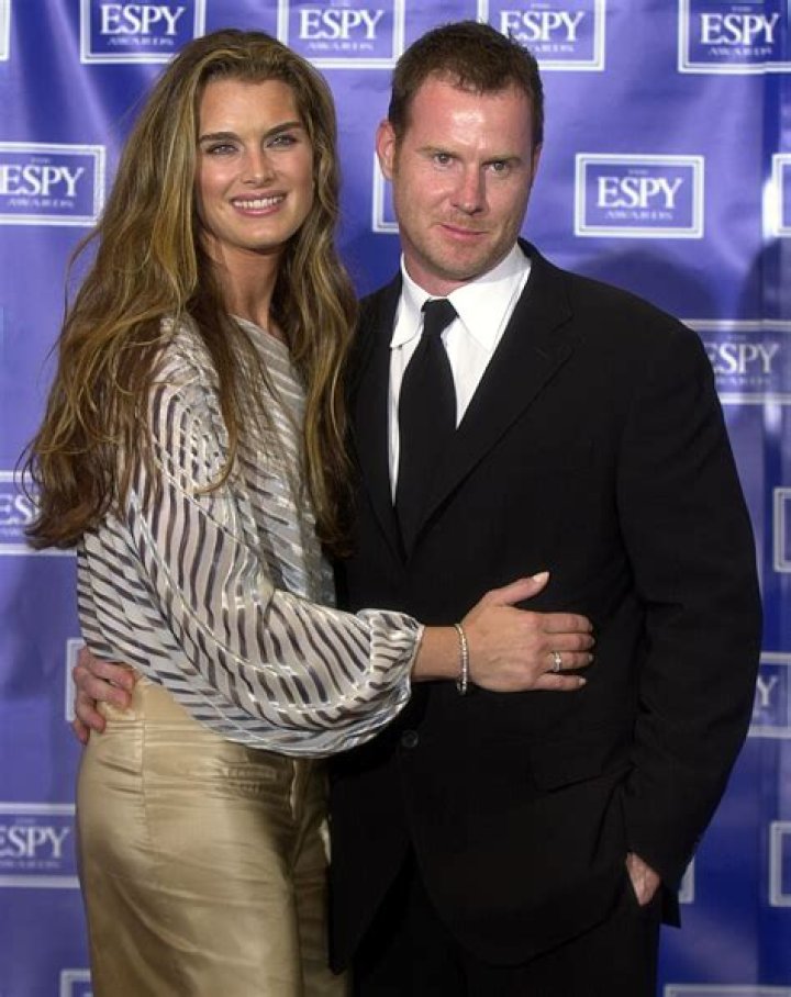 Brooke Shields poses with husband Chris Henchy and daughter Grier, 17