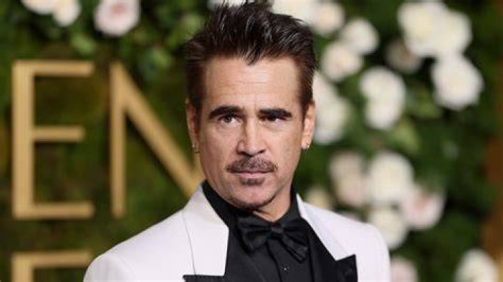 Colin Farrell arrives with his glamorous mother Rita at the Golden