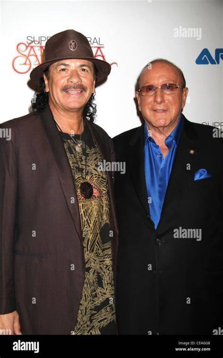 Davis with Carlos Santana at the Grammy Awards in 2000. Santana's awards included album of the year for 'Supernatural' which Davis co-produced