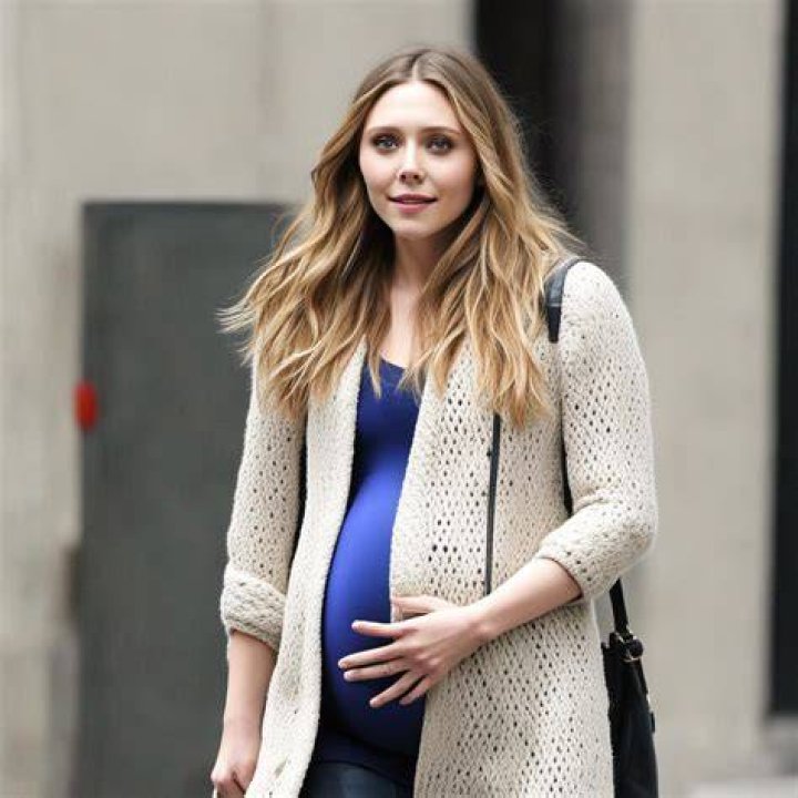 Elizabeth Olsen pretending pregnant 9 by jerry999999 on DeviantArt