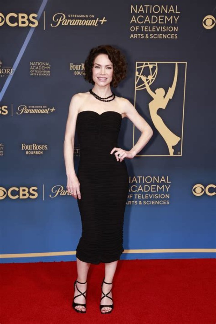 Image of Rebecca Herbst with her husband Michael Saucedo and their kids