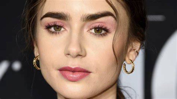 Inside Lily Collins' Relationship With Eddie Redmayne