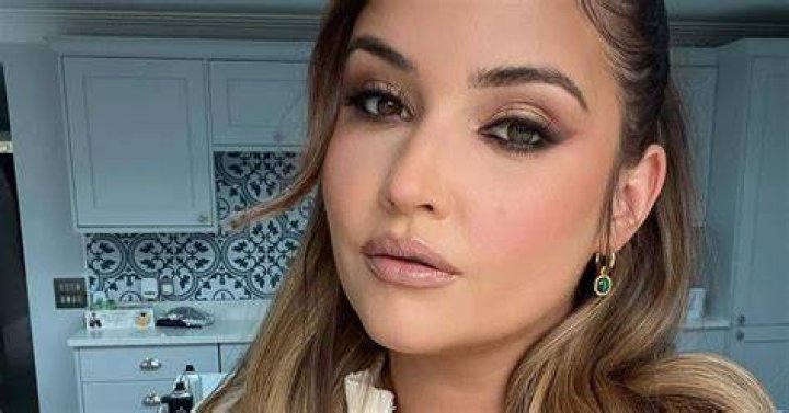 Jacqueline Jossa locks lips with husband Dan Osborne as the pair