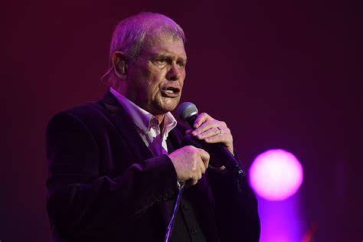 John Farnham is awake and stable in ICU after surgery