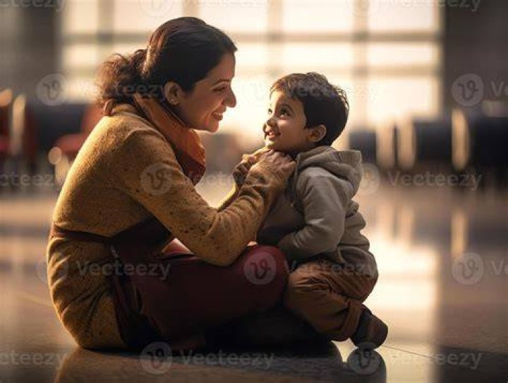 little kid with his mom to clean Stock Photo Alamy