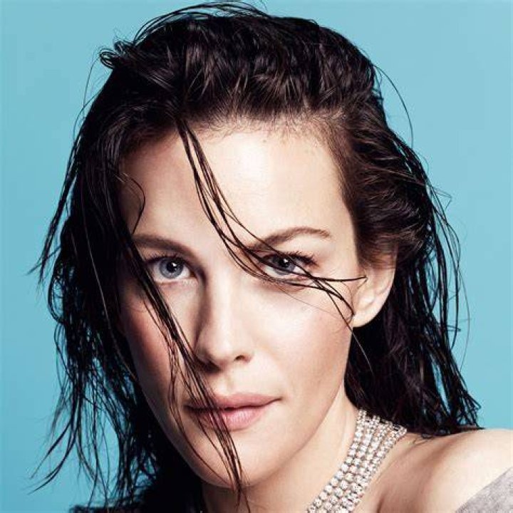 Liv Tyler Goes Wild in Tiger Print Coat for Stella McCartney x Adidas