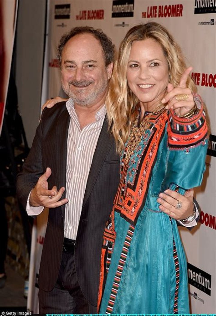 Maria Bello flashes gold ring on wedding finger that may be from beau