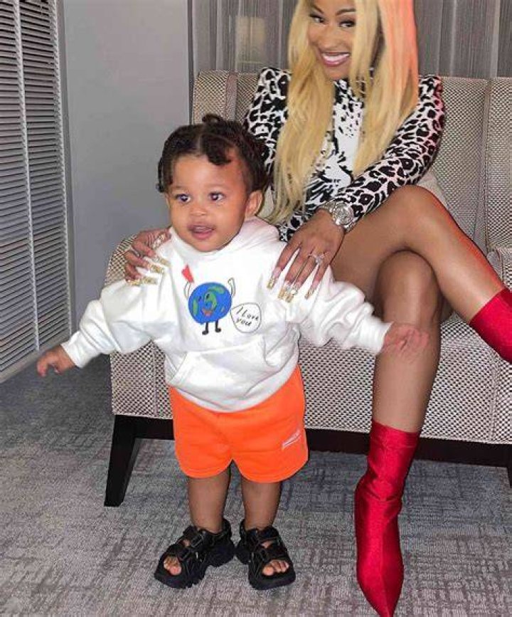 Nicki Minaj cradles ninemonthold son 'Papa Bear' as the duo sport