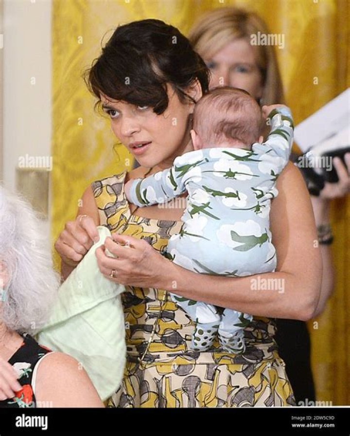 Norah Jones takes her cherubic baby boy for a rare outing as she and
