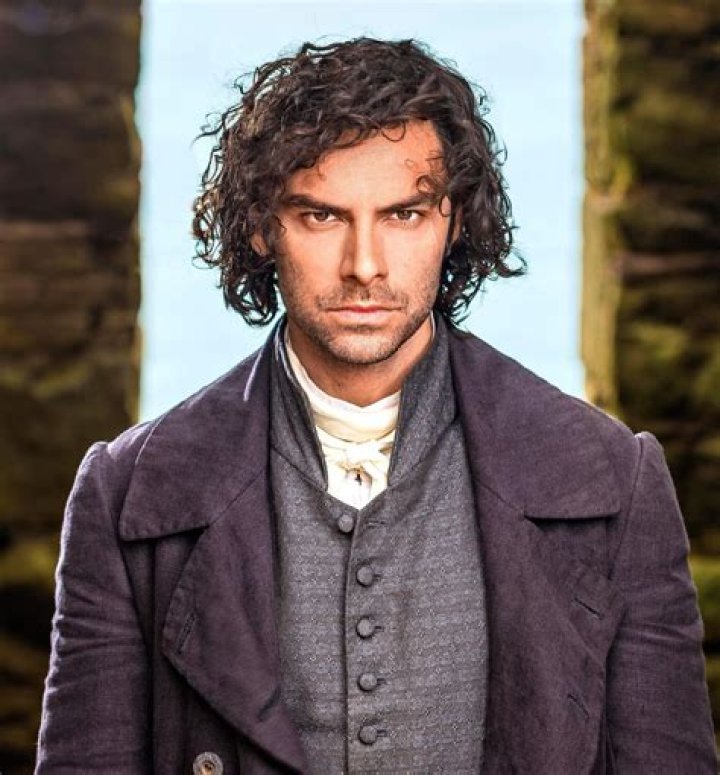 Poldark&rsquo;s Aidan Turner looks unrecognisable on walk with wife as she
