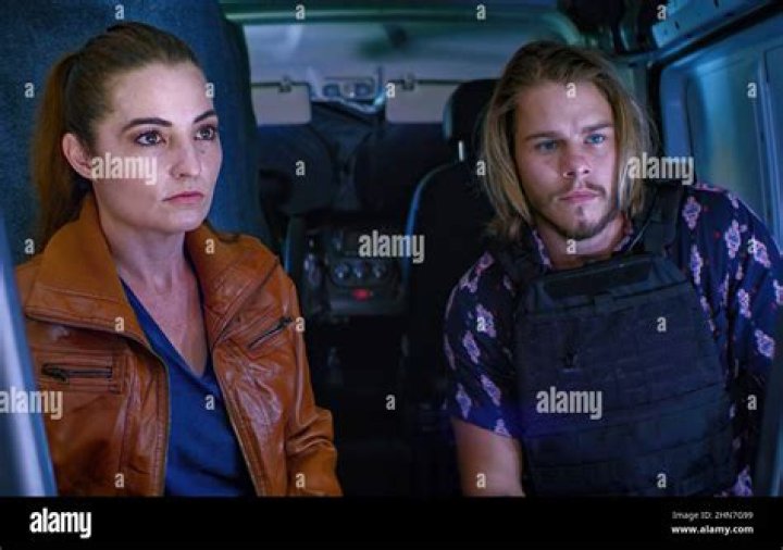 PURSUIT, from left Laurie Love, Jake Manley, 2022. &copy; Lionsgate
