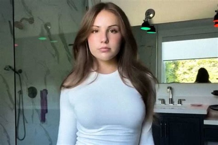She opened her OnlyFans account at age 20 to pay for college and now