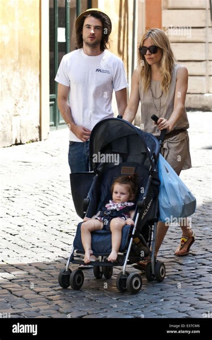 Tom Sturridge carried his daughter, Marlowe, in his arms when he took